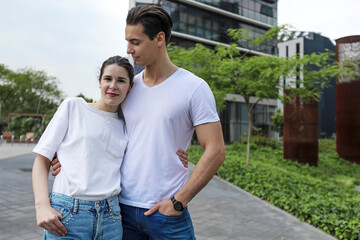 Portrait of smiling beautiful woman and her handsome boyfriend in casual summer clothes.