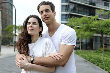 Obraz premium Portrait of smiling beautiful woman and her handsome boyfriend in casual summer clothes.
