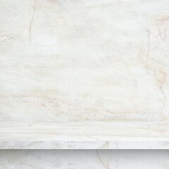 perspective of polished light colored marble tabletop and marble wall for interior and display show products. studio room
