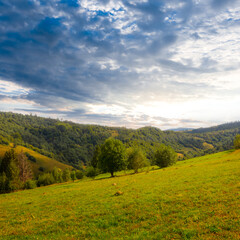 Fototapeta na wymiar green mountain valley at the sunset