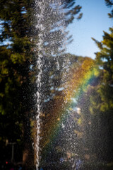 Rainbow against stream of water