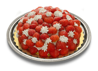 gorgeous whole cake with strawberries and cream on a silver tray and isolated over white background