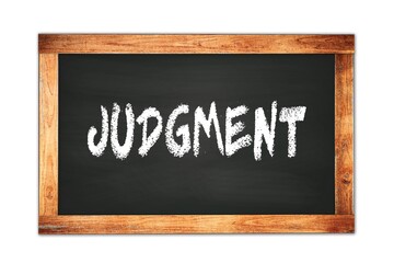 Obraz premium JUDGMENT text written on wooden frame school blackboard.