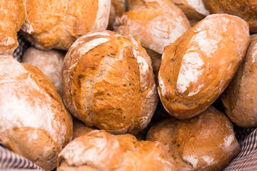 ruddy rolls of fresh warm grain bread