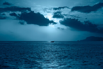 Night sky with moon in the clouds 