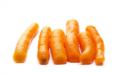 Cooked carrots pile isolated on white  