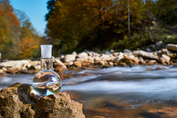Clean drinking water. Flask with water.