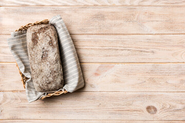 Freshly baked bread on basket against natural background. top view bread copy space