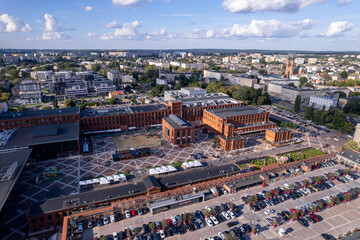 Obraz premium Łódź City on a sunny day. Characteristic places, buildings and streets. Piotrkowska Street from the bird's eye view.