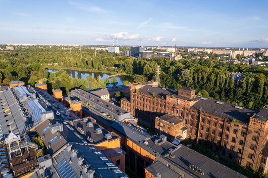 Ł&oacute;dź City on a sunny day. Characteristic places, buildings and streets. Piotrkowska Street from the bird's eye view.