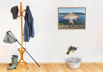 The equipment for fishermen in an empty room with the catch on picture on a wall.