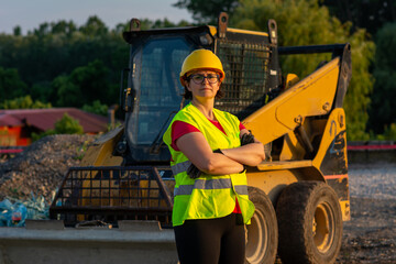 Portrait of female project manager on construction site