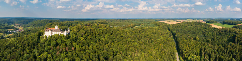 Fototapeta na wymiar Bird's-eye view of the Greifenstein Castle in the middle of a forest in Upper Franconia/Germany