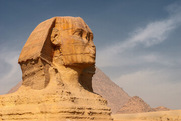 Fototapeta na wymiar The Great Sphinx of Giza. Great Sphinx on a background of pyramids.