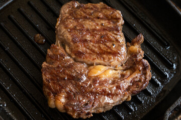 grilled steak on the grill