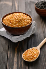 Fresh organic natural peas on a wooden rustic black background