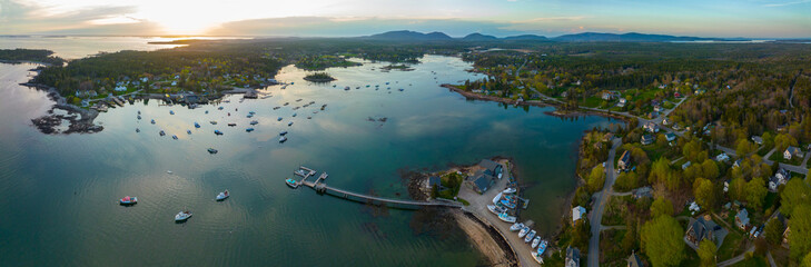 Bass Harbor and village aerial view at sunset with Mountains in Acadia National Park at the background in town of Tremont on Mt Desert Island, Maine ME, USA.  - obrazy, fototapety, plakaty