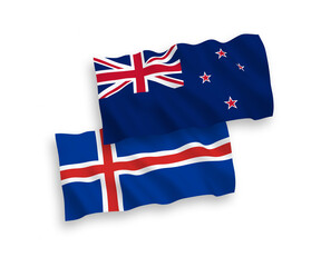National vector fabric wave flags of New Zealand and Iceland isolated on white background. 1 to 2 proportion.