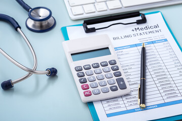 Calculator on medical billing statement with stethoscope, hospital payment, healthcare cost
