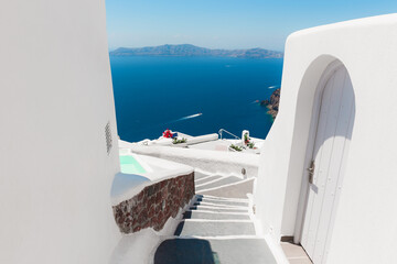 Fototapeta na wymiar White architecture on Santorini island, Greece. Summer landscape, sea view. Travel destination concept