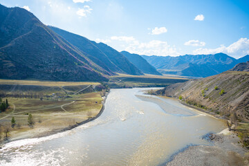 Confluence of Chuya and Katun rivers in Altai mountains, Siberia, Russia. Spring landscape. Famous...