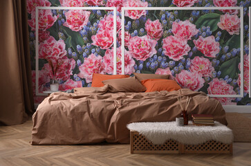 Beautiful wallpaper with image of blooming flowers in bedroom interior