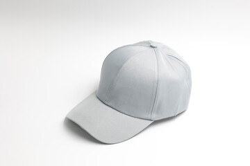 one light grey plain cap for men isolated on a white background, side top view