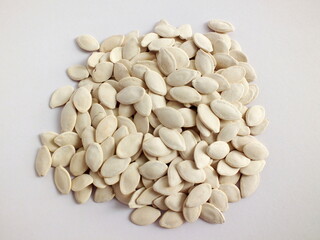 pumpkin seeds on white background