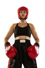 Portrait of professional female boxer in sports protective equipment posing isolated on white studio background. Sport, competition, hobby, results, success concept