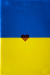 background with a heart on the background of the Ukrainian flag