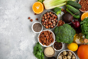 Assorted vegetables on light surface, cooking and clean eating concept