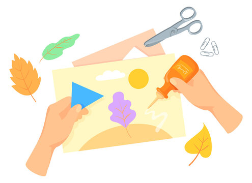 crafting scene with glue, scissors, leaves, paper clip art preview