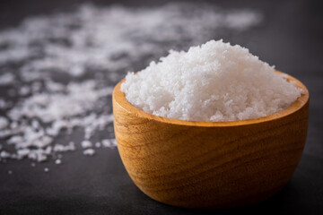 Salt in wooden bowl