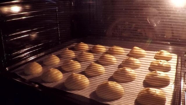 Bake fresh French profiteroles in the home oven. Time lapse