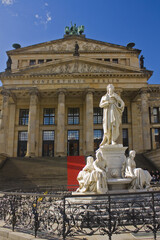 Fototapeta na wymiar Schiller Monument in front of Concert Hall (Konzerthaus Berlin) in Berlin 