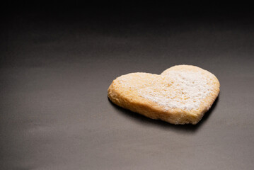 Shortbread in the shape of a heart isolated on white background.