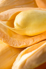 closeup of jackfruit flesh with seeds, tropical health beneficial fruit native to southeast asia, taken in shallow depth of field, macro  © Shamil