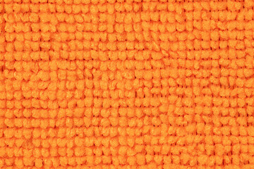 Closeup of orange Microfiber clothes texture for background