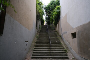 Fototapeta na wymiar The stairs of the street Camille Bombois. Paris, France the 29th may 2022.