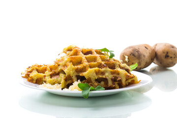 fried potato waffles with cheese in a plate on white background
