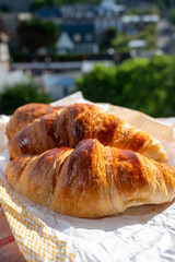 Two fresh baked butter croissants from French bakery