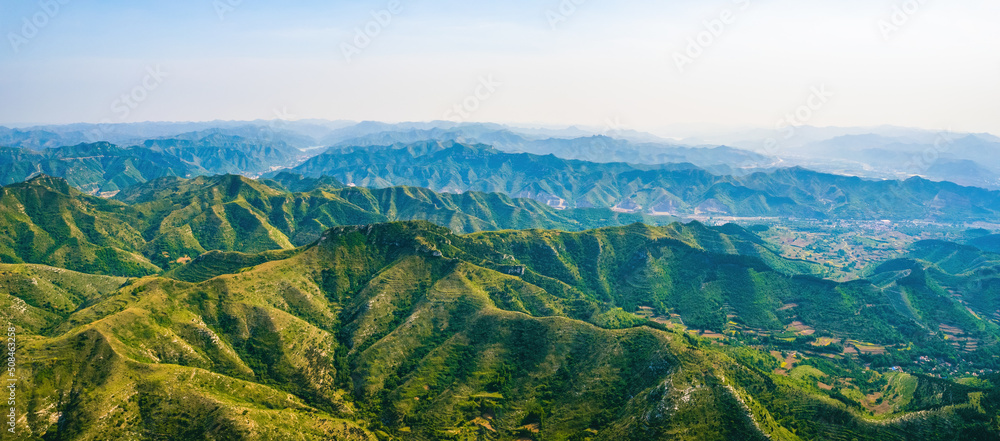 Wall mural Mountain scenery in the summer