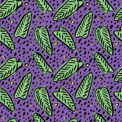 Seamless tropical pattern with hand drawn palm leaves