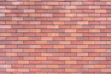 Brick wall of the building. Designer building background.