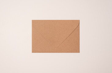 Closed craft envelope on light background of a milky color