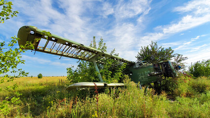 old plane at an abandoned airfield 