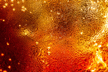 Macro cola texture,cola with ice food background, cola close-up, design element. beer macro bubbles, ice, bubble, background, ice cubes, abstract backgrounds 