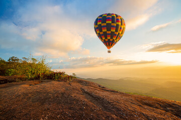 Colorful hot air balloons flying over mountain at Dot Inthanon in Chiang Mai, Thailand.