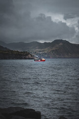 Boat in a moody storm, Azores