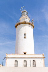 historic lighthouse of the port of Malaga known as the lamppost